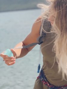 girl holding menstrual cup
