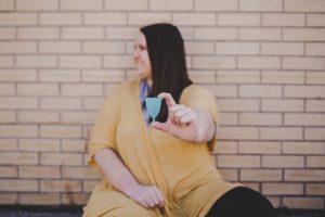 holding menstrual cup