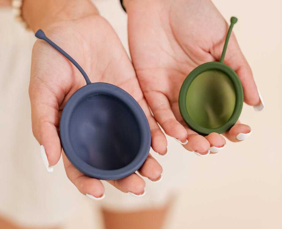 How do you insert a menstrual disc?