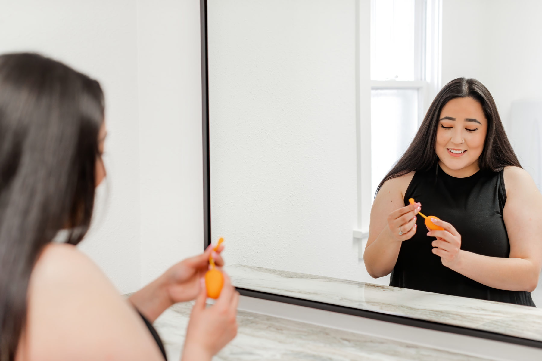 Woman washing kegel weights